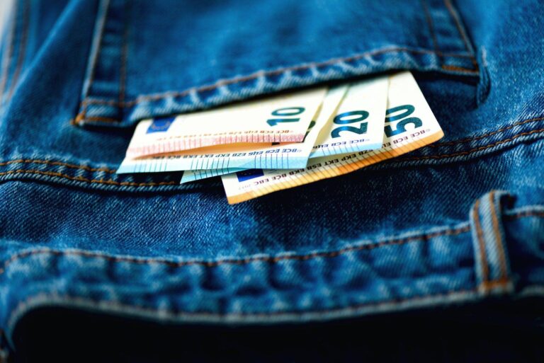 euro banknotes in jeans pocket success wealth and poverty poorness concept euro currency